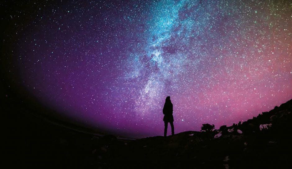 night sky with woman looking up